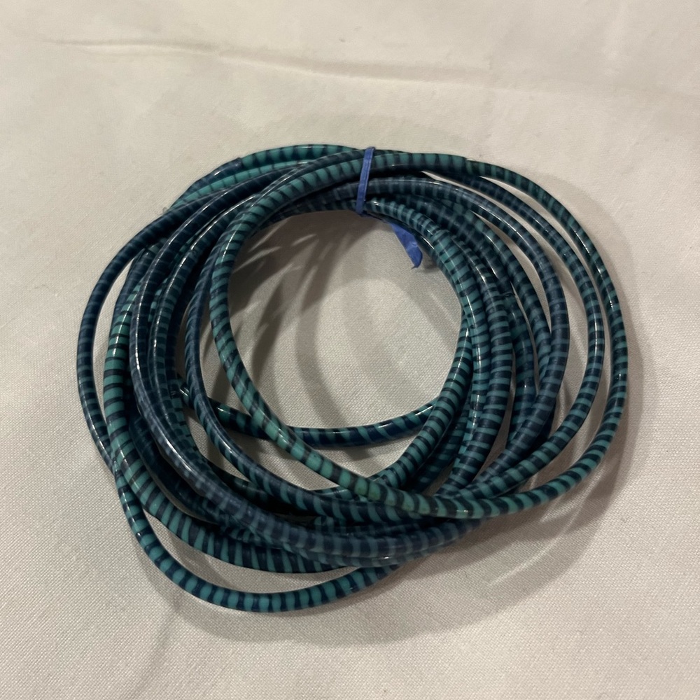 Recycled plastic soft bangles bracelets from Mali, West Africa.